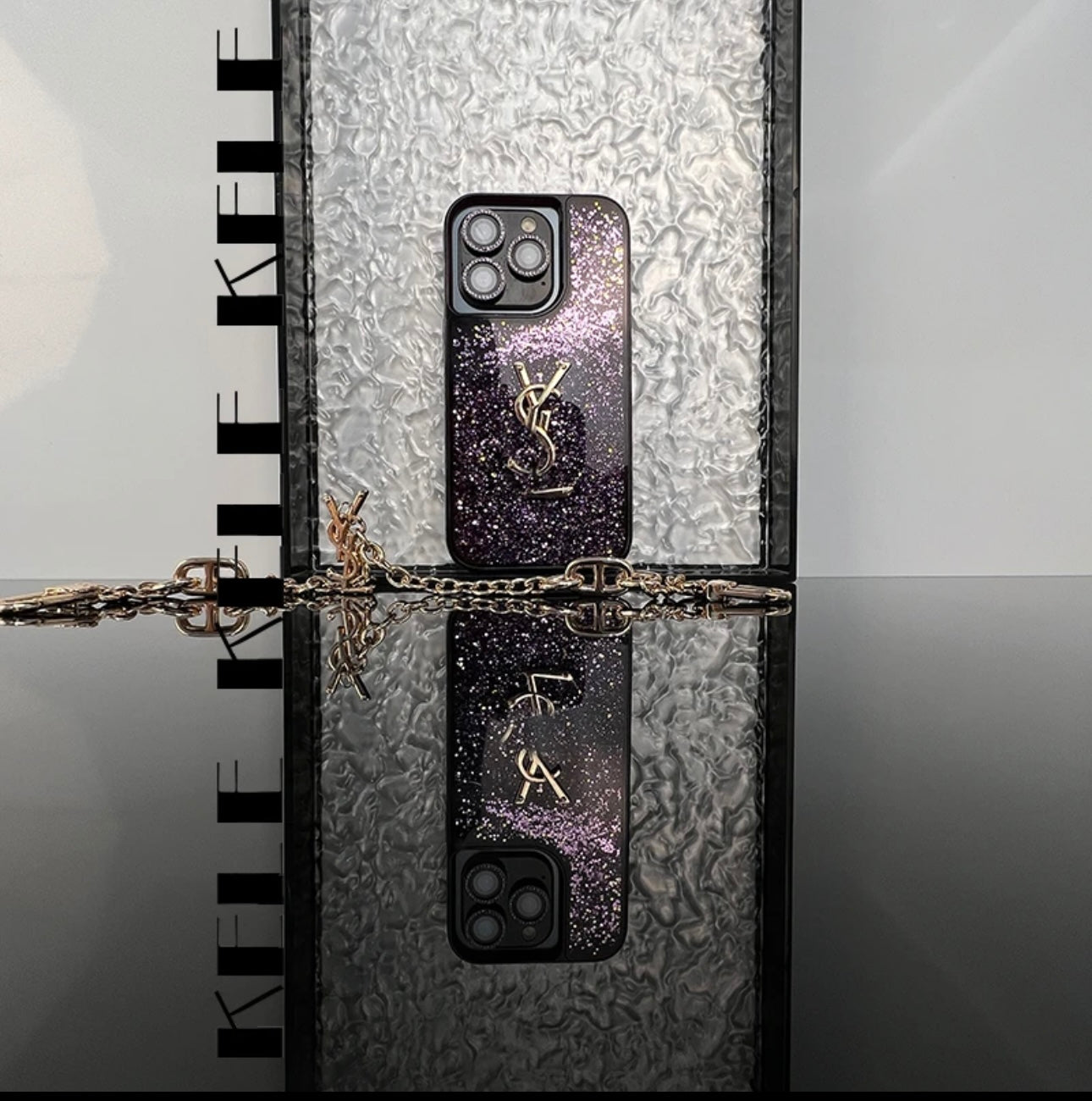 YSL Shine X mono iPhone Case (z verigo)